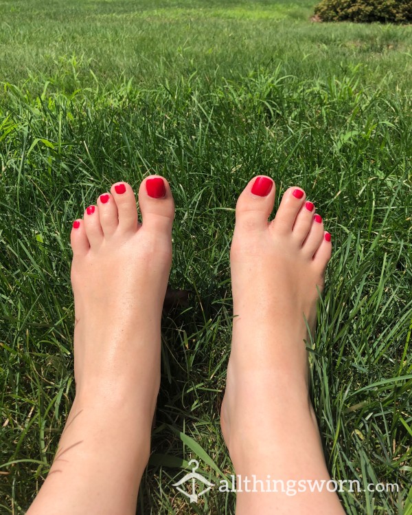 Bare Feet In Grass