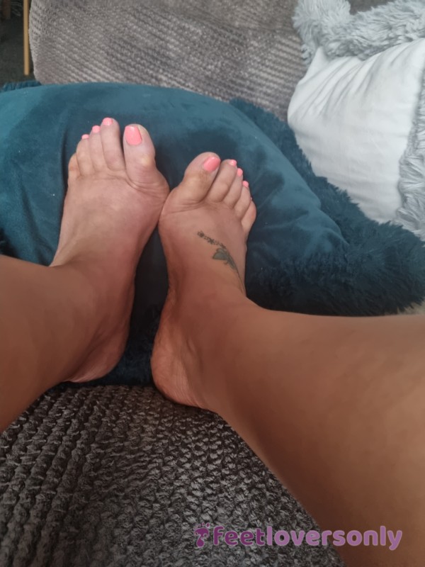 Bare Feet With Painted Toes