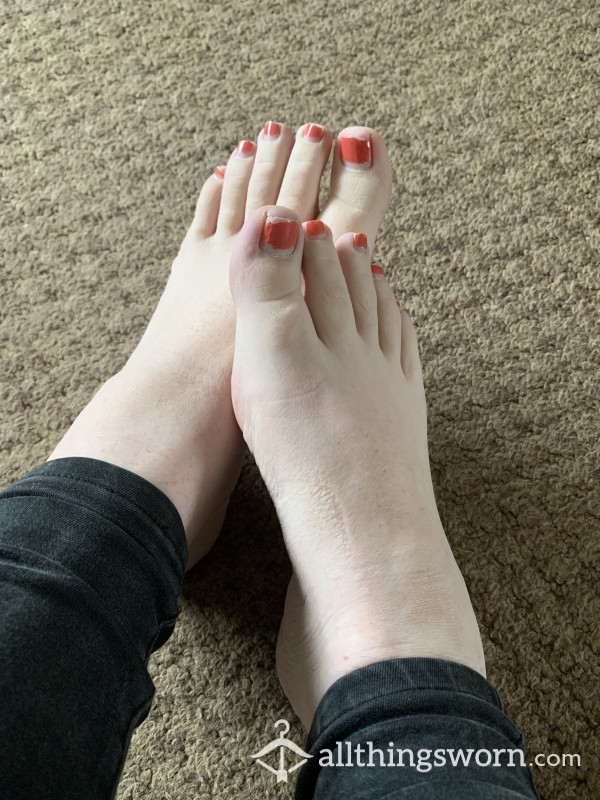 Chipped Orange Toe Nails