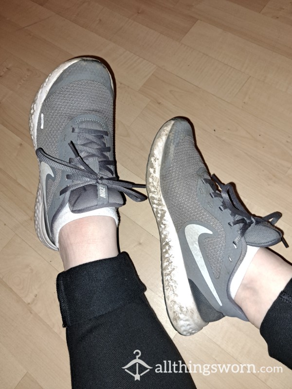 Dirty, Worn Nike Grey Trainers