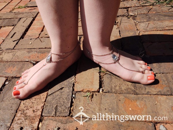 Foot Jewelry And Orange Pedicure Photo Set In The Sun