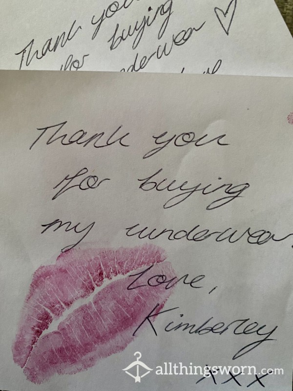 Handwritten Note Sealed With A Lispstick Kiss.