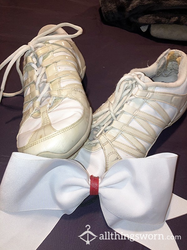 Old Worn Down Stinky Cheerleader Shoes And Hair Bow