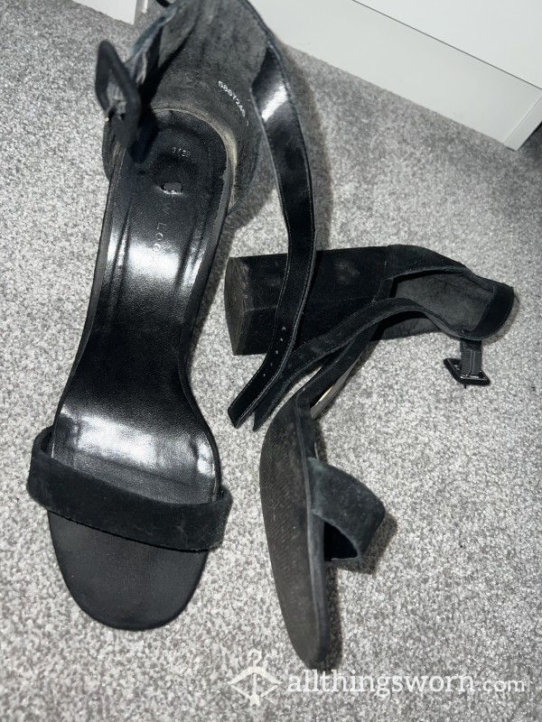 Old Worn Out Black High Heels