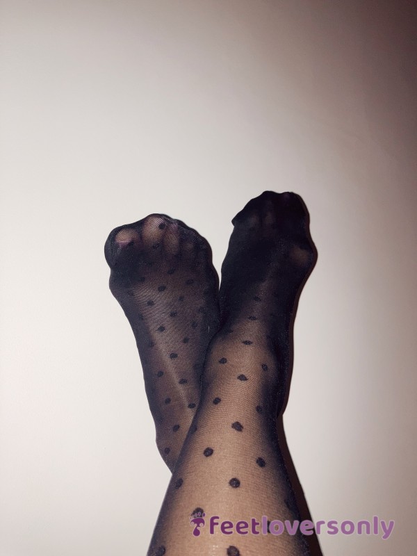 Playful Feet In Black-dot Stockings