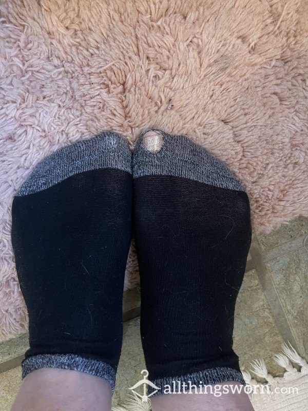 Well Worn Socks With Hole