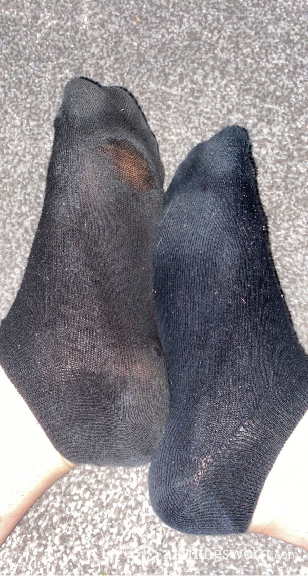 Well Worn Socks With Holes..