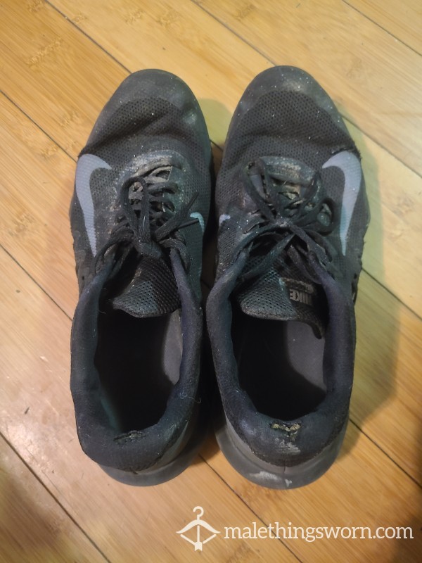 Well-worn Used And Abused Mens Sneakers