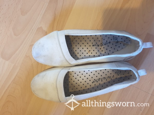 Well Worn White Canvas Shoes
