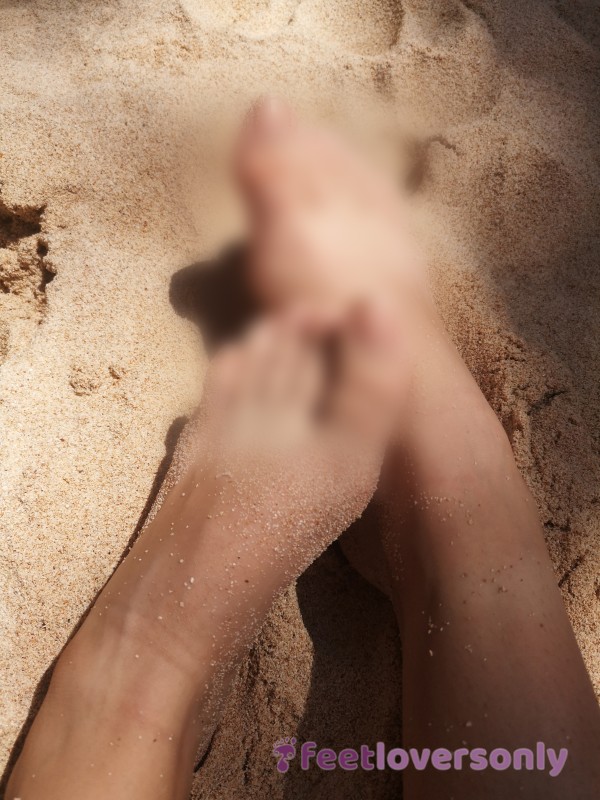 Young Cute Student's Feet In Sand